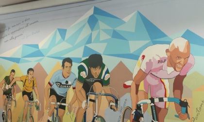 La scuola media di Rodano non ha un nome: realizzato un murale per intitolarla a Gino Bartali