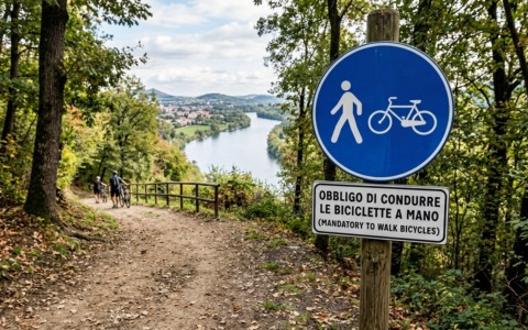 Sentiero dell’Adda, il cartello “Biciclette a mano” fa arrabbiare i pendolari